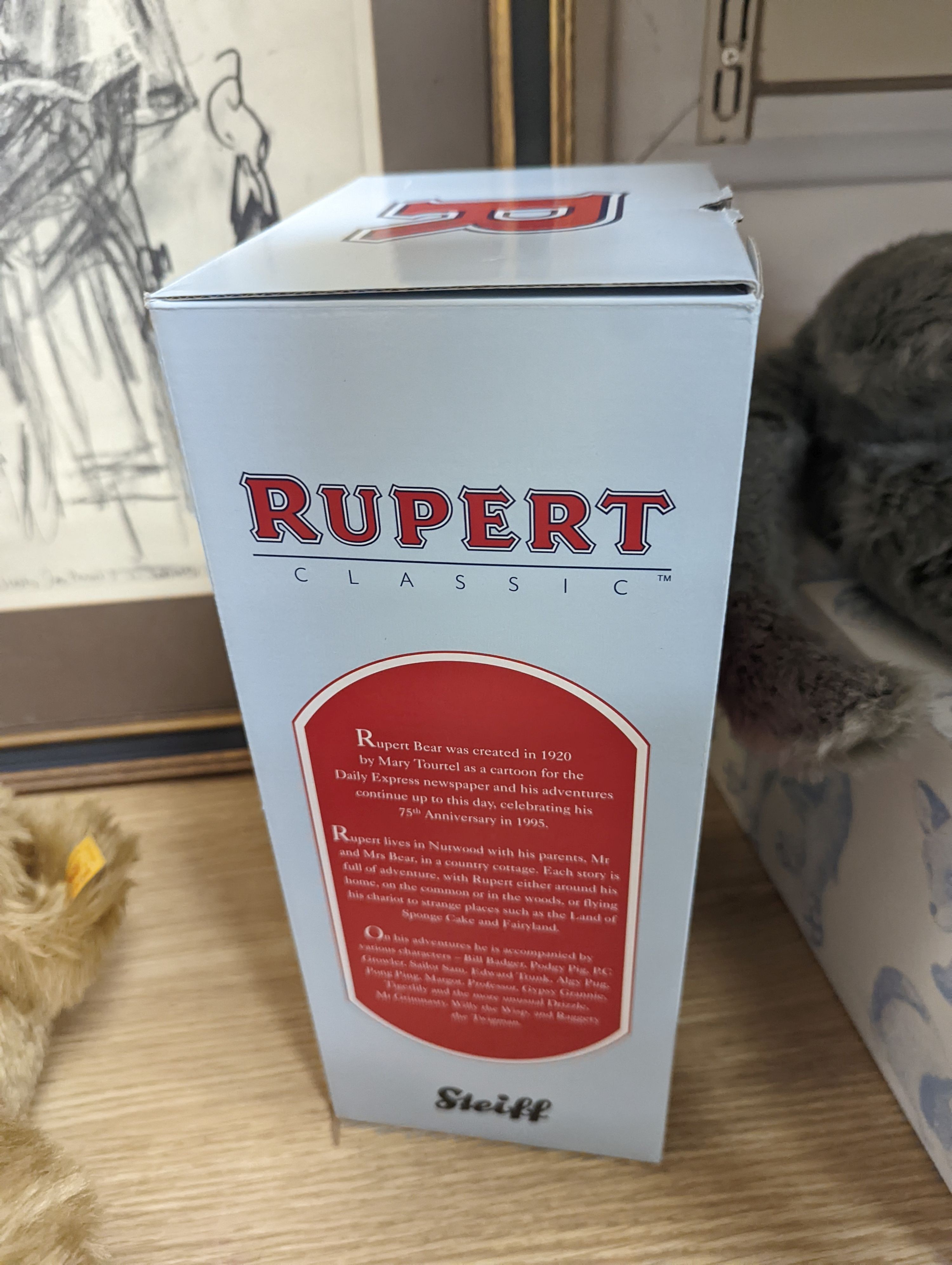 Steiff Classic 1903 bear with Steiff Limited Edition 'Algy' Pug from Rupert Series with Steiff Limited Edition 'Bill the Badger', Rupert Series both with box and certificate, bear 47 cms high.